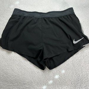 Nike Aeroswift Women's Size Small Black Tie Waist Reflective Zip Pocket Shorts